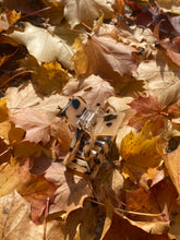 Lade das Bild in den Galerie-Viewer, Millane Leo
